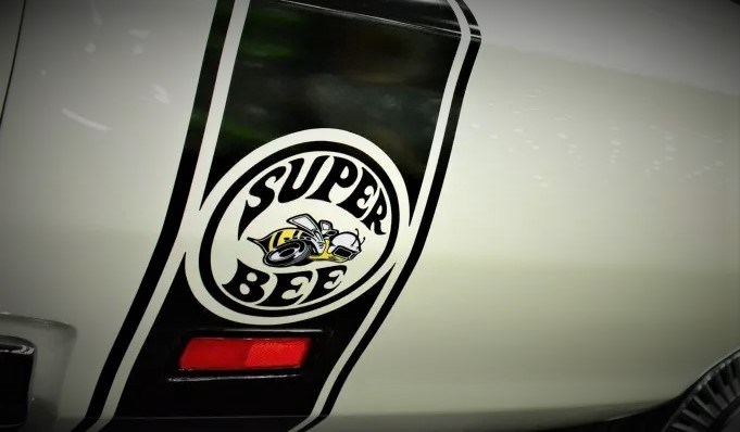 Super Bee logo stripe on back of a dodge