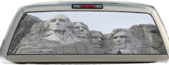 mt rushmore decal on the back of a truck window