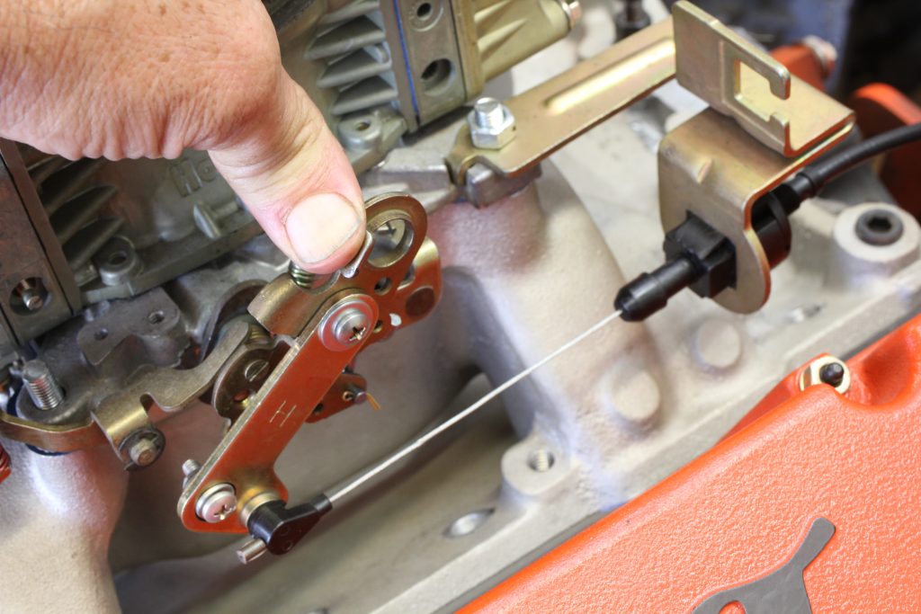 a close up look at the throttle valve automatic transmission kickdown lever on a carburetor