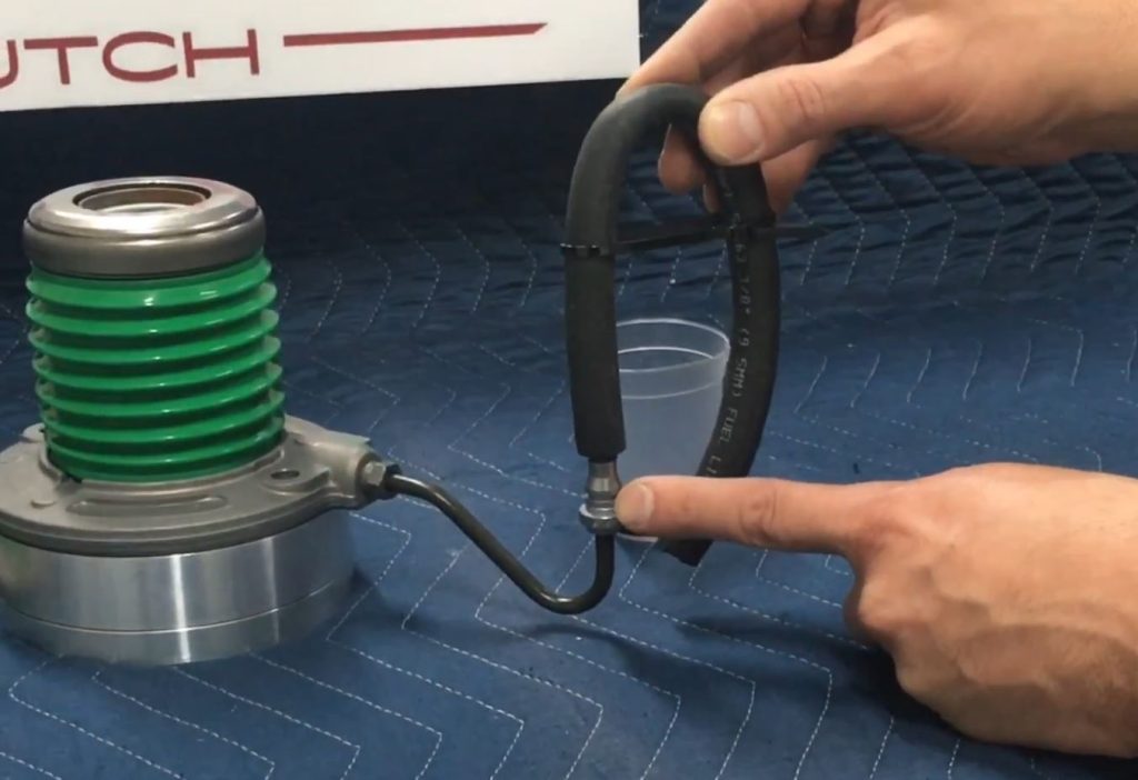 close up a hydraulic clutch throw out bearing fluid tube