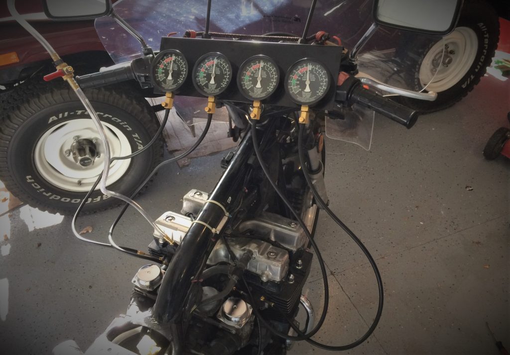 motorcycle with cab vacuum sync tool installed