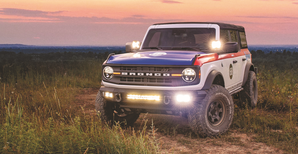 summit racing project baja bronco at night with off road lights on