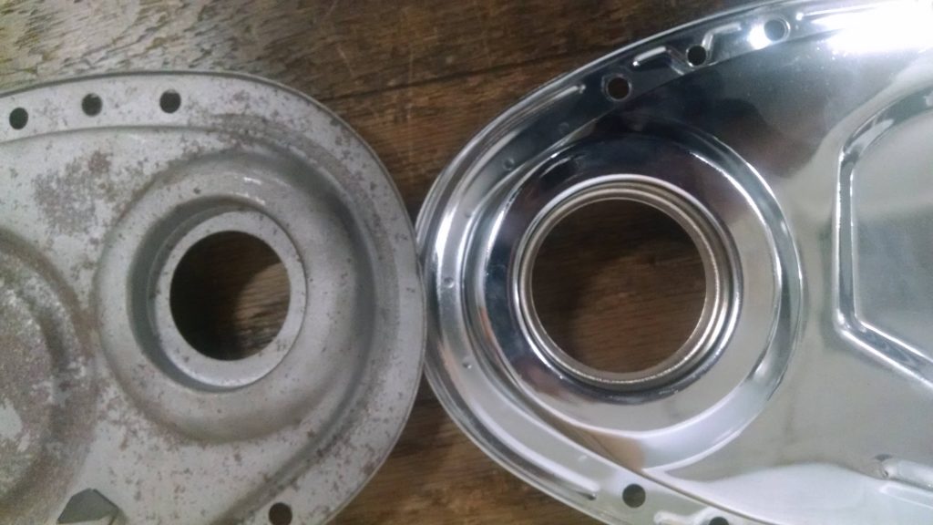 Cadillac dragster engine new and old timing cover comparison