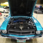 engine under the hood of a vintage Shelby gt500