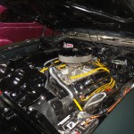small block chevy v8 engine in a muscle car