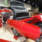 rear view of a first-gen red plymouth gtx convertible