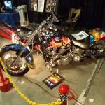 custom v twin motorcycle in car show display