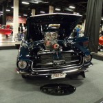 1967 ford mustang pro street at a car show