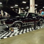 black oldsmobile 442 fastback coupe