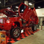 custom ford super duty truck with scissor doors and tilt bed