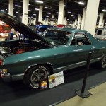 customized chevy el camino at indoor car show