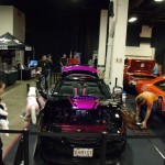 classic cars in a car show indoor event