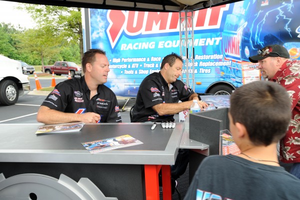 drag racers greg anderson & jason line signing autographs