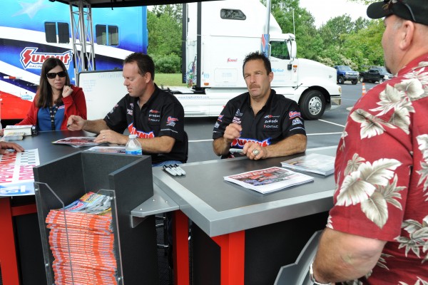 drag racers greg anderson & jason line signing autographs