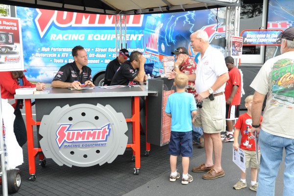 drag racers greg anderson & jason line signing autographs