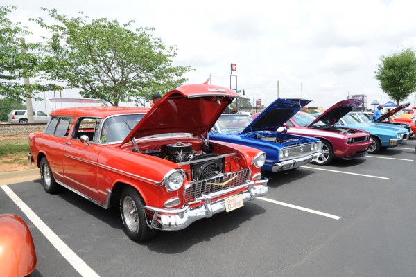 chevy nomad in a row of classic cars at a car show