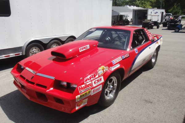 third gen chevy camaro drag car near trailer