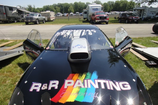 close up of hood coop on a late model pontiac drag car