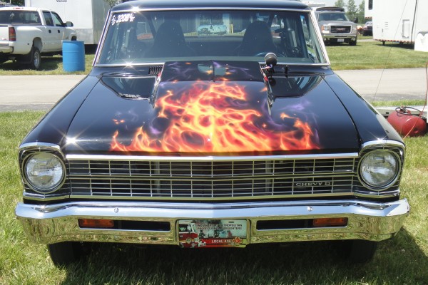 chevy 2 nova drag car with flame paint job