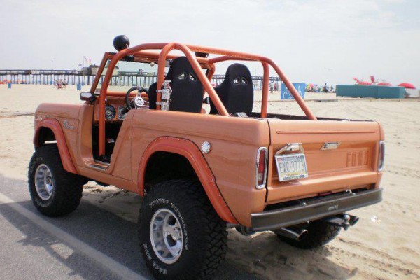 first gen Ford Bronco on beach