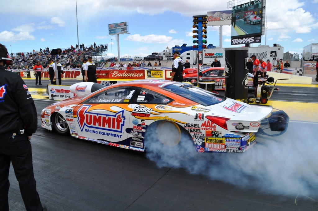 jason line doing a burnout prior to drag race