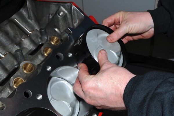 installing pistons into an engine