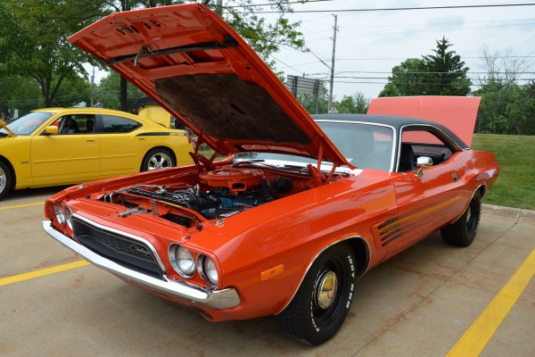 first gen orange dodge challenger with vinyl roof