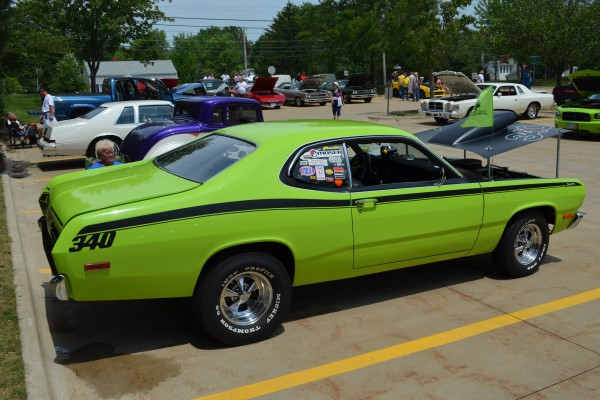 side view of a green plymouth duster 340
