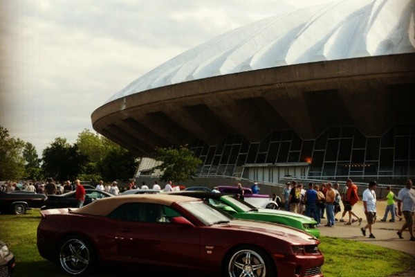 crowd at a classic collector car show