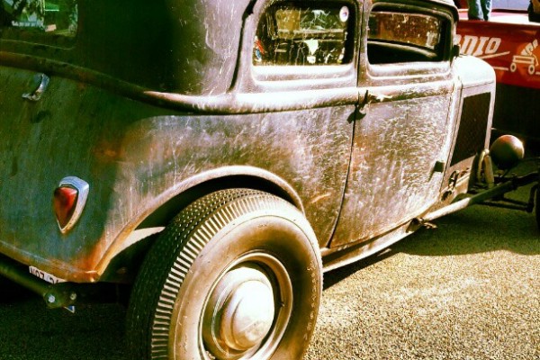 rear side view of a rat rod hot rod