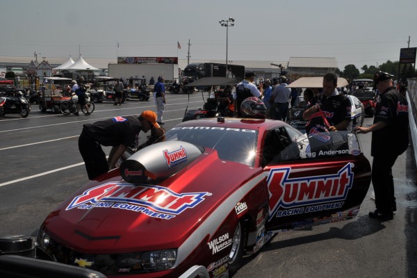 crew servicing pro stock camaro before race