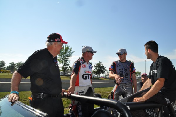 nhra racers talking after a drag race event