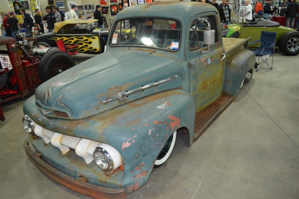 vintage ford truck with pinstripes and patina