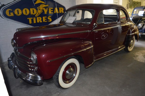 vintage prewar coupe in antique car collection