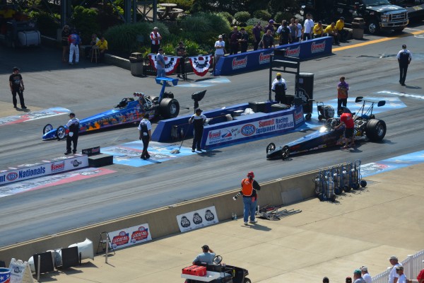 a pair of dragsters staging before a race