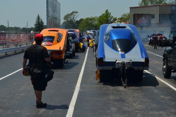 nhra funny cars in staging lanes prior to race
