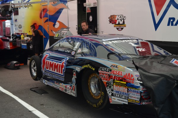 jason line's nhra pro stock camaro in pits