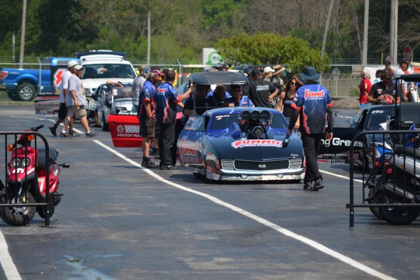 line of cars staging at 2012 NHRA Summit Racing NHRA Nationals