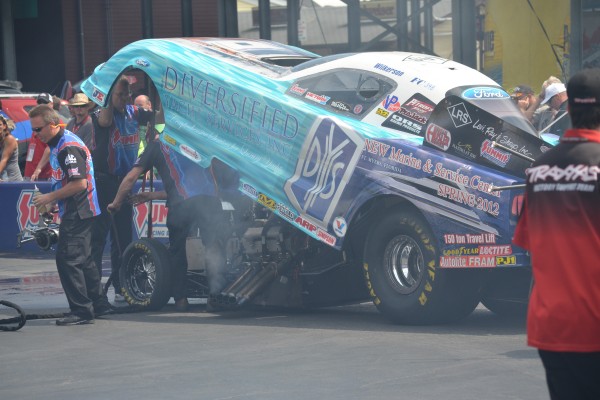 nhra funny car prepping before a race