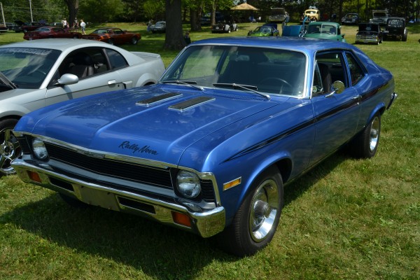 vintage blue chevy rally nova at a car show