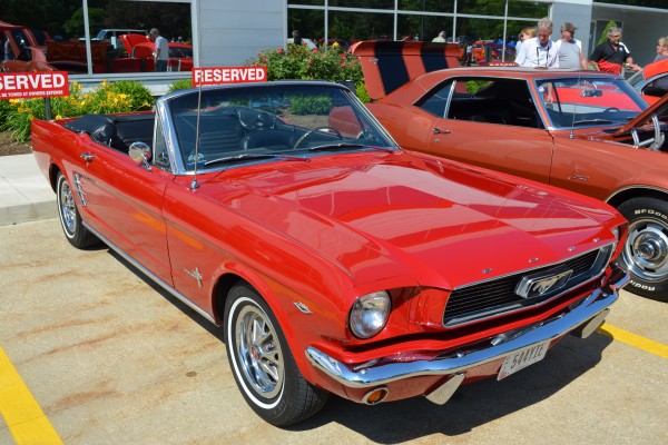 red first gen ford mustang convertible