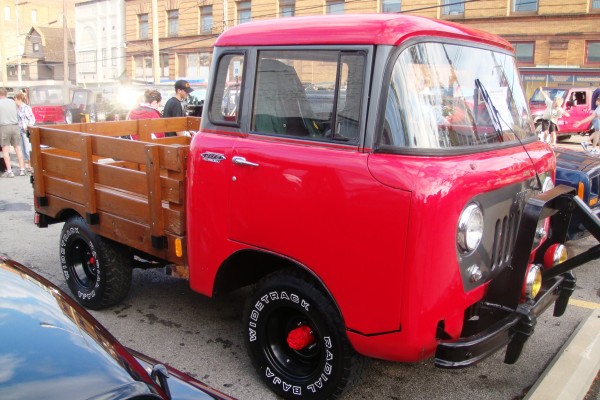 Classic red Jeep truck Forward Control