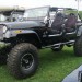 Black Jeep with doors off thumbnail
