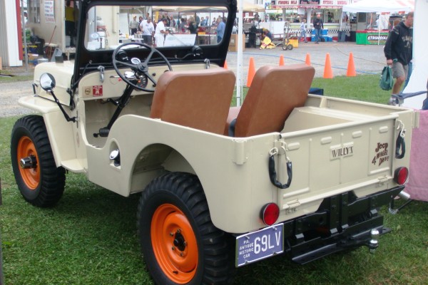 Classic Willys Jeep with orange wheels