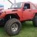 Lifted red Jeep thumbnail