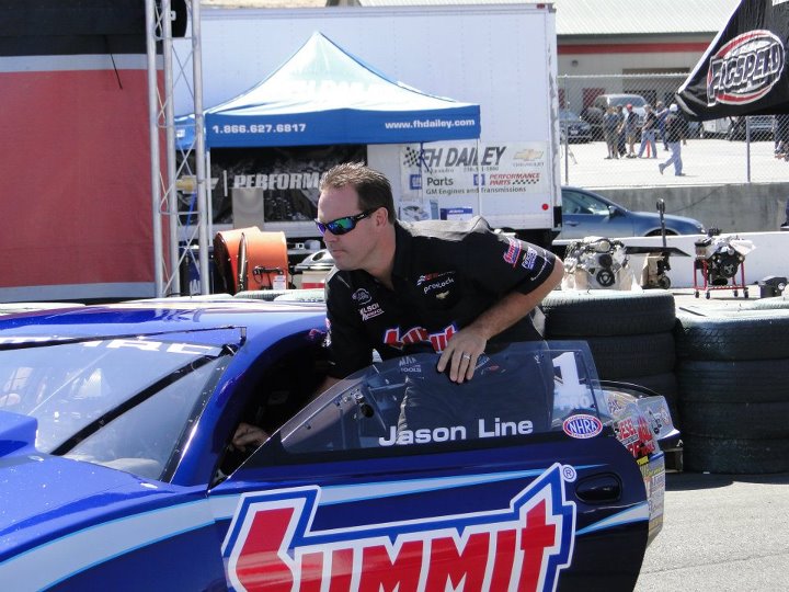 jason line with his 2012 nhra pro stock camaro