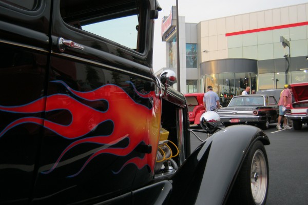 Black street rod with flame decal