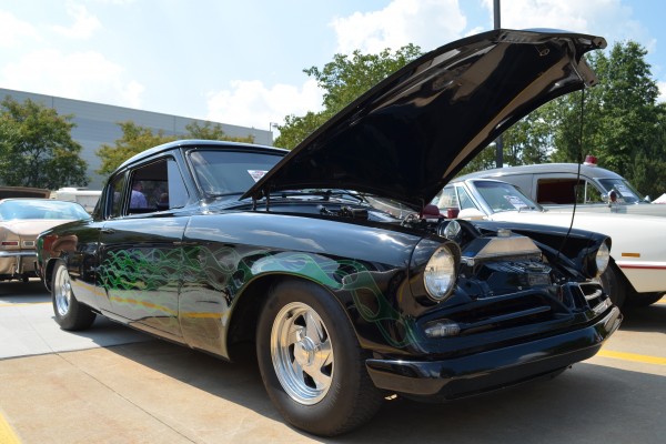 hot rod studebaker coupe with custom wheels