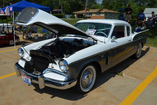 vintage studebaker coupe with hood up