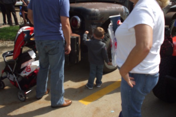 people at a car show
